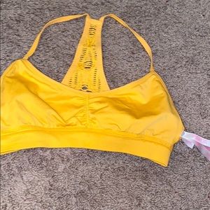 Pink Victoria’s Secret sports bra